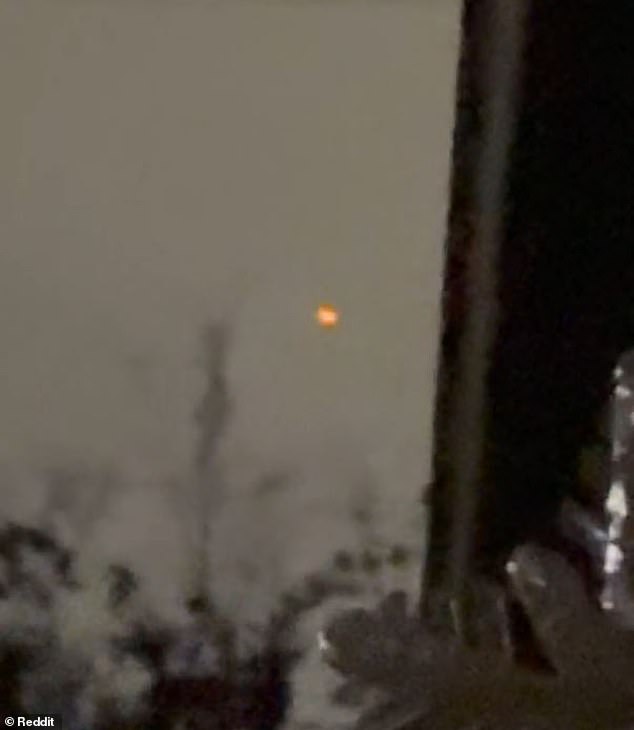 Around 12:10am on January 1, the user, who was visiting family in a city just outside Nashville, then tried to capture the object 'as quickly as possible,' snapping a near 35-second clip of the glowing orb