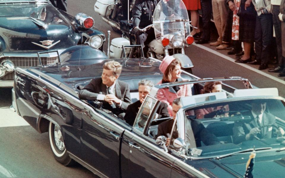 John F Kennedy and his wife, Jacqueline, minutes before he was assassinated, Nov 22 1963