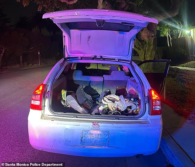 A car full of items stolen from evacuated homes after looters were caught by police