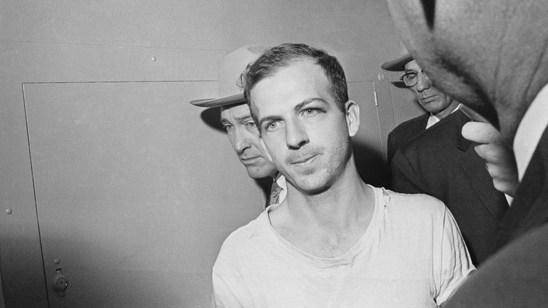 Lee Harvey Oswald being taken for police questioning after shooting. Pic: AP